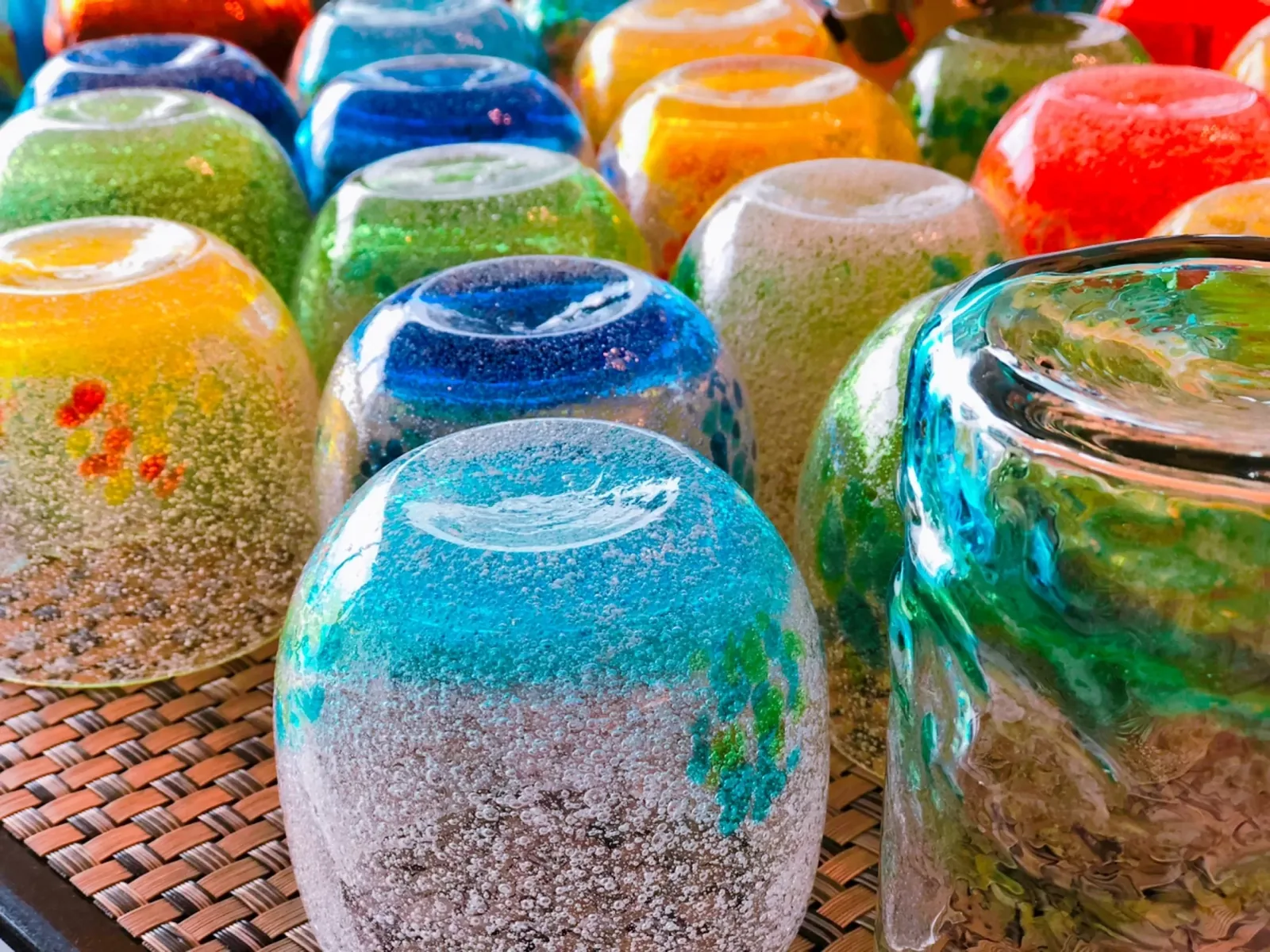 Ryukyu glassware in bright colours displayed in a Naha shop
